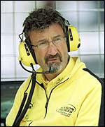 Eddie Jordan watches on from the pit lane