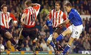 Brian McBride scores his third in two games for Everton