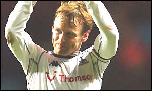 Teddy Sheringham applauds the Tottenham fans after their 1-0 win at Aston Villa