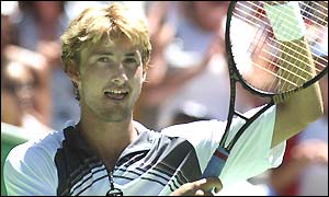 Juan Carlos Ferrero acknowledges the crowd after his easy victory over Mario Ancic