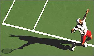 Sebastien Grosjean serves during his five-set victory over Felix Mantilla