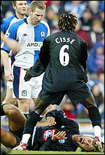 Andy Todd (left) looks over Birmingham's Christophe Dugarry (on the floor)