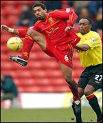 Norwich's David Nielsen and Marcus Gayle of Watford clash at Vicarage Road