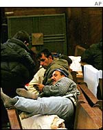 Refugees take shelter in a Calais church