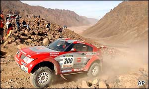 Japanese driver Hiroshi Masuoka negotiates a tight turn in the last stage of the 25th Paris Dakar rally