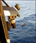 A boat full of Moroccan migrants, as seen from a helicopter 
