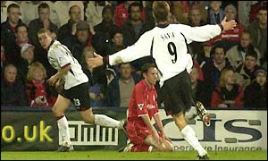 Sean Davis and Facundo Sava celebrate David's goal