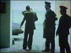 Police investigate the scene of the shooting