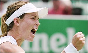America's Meghann Shaughnessy celebrates after her hard-fought victory over Russian rival Elena Bovina 