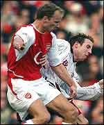 Dennis Bergkamp (left) and Lee Bowyer 