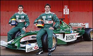 New Jaguar drivers Mark Webber and Antonio Pizzonia perch on the end of the new model