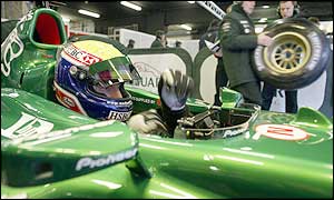 Mark Webber sits in the cockpit of the Jaguar Formula One car