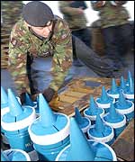 The 7th Armoured Brigade unpacking tank rounds