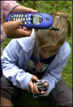 Youngsters using mobiles, BBC