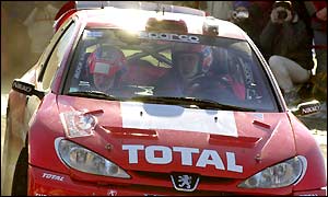 Finland's Marcus Gronholm led in the Peugeot after day one