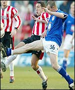 Millwall striker Steve Claridge battles against the odds