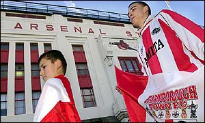 Two young Farnborough fans arrive at Highbury