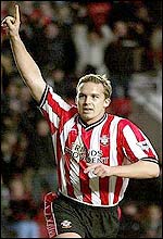 Southampton striker Kevin Davies celebrates his late equaliser against Millwall