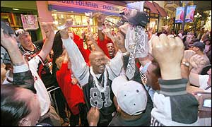 Fans from both teams show their support as they arrive in San Diego 