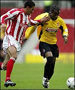 Stoke's Karl henry (left) and Danny Thomas of Bournemouth