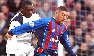 Crystal Palace's Hayden Mullins gets ahead of Emile Heskey of Liverpool