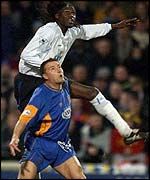 Shrewsbury's Nigel Jemson and Chelsea's Mario Melchiot challenge for the ball