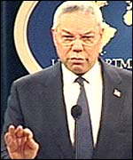 Colin Powell speaks to reporters at the State Department