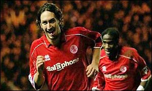 Massimo Macarone runs away in celebration after scoring for Boro to make the score 2-1 to Villa
