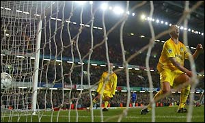 The ball is deflected off Dominic Matteo for an own-goal to give Chelsea victory