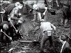 Men dig away at the slag heap that covered the Aberfan school