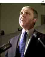 United States Attorney Michael Sullivan faces reporters at Federal Court in Boston