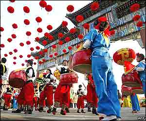 Drummers perform at the opening ceremony of the annual Temple of the Earth fair in Beijing 