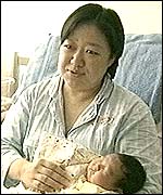 Mrs Gao with her son