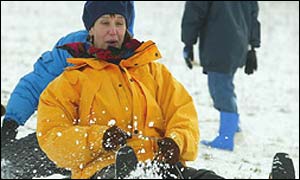  lady on a sledge in Wandlebury, Cambridgeshire