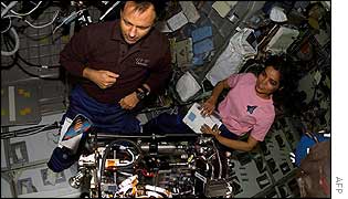 Ilan Ramon and Kalpana Chawla with the Combustion Module-2 (CM-2) facility 
