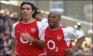 Pires and Wiltord celebrate