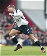 Steven Gerrard turns to celebrate his goal