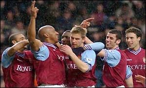 Dion Dublin celebrates