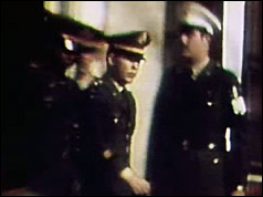 Lieutenant Calley (centre) leaves court after being found guilty