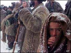 Afghans queue for aid