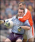Steven McDonnell of Armagh gets to grips with Dublin's Paddy Christie