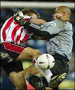 James Beattie clashes with Tony Warner