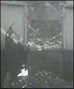 Man digging coal out of train