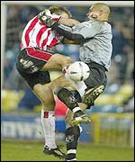 James Beattie challenge Millwall keeper Tony Warner