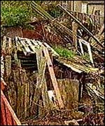 Piles of rubbish in garden