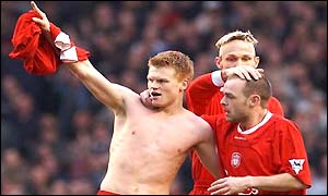 John Arne Riise of Liverpool celebrates his equaliser