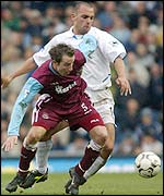 West Ham's Lee Bowyer is closely watched by Leeds debutant Raul Bravo