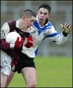 St Pat's Maghera's Liam Hinphey is about to make a challenge