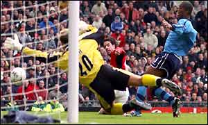 Ruud van Nistelrooy scores the opener in the Manchester derby