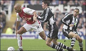 Thierry Henry gives the Newcastle defence a torrid time in the first half